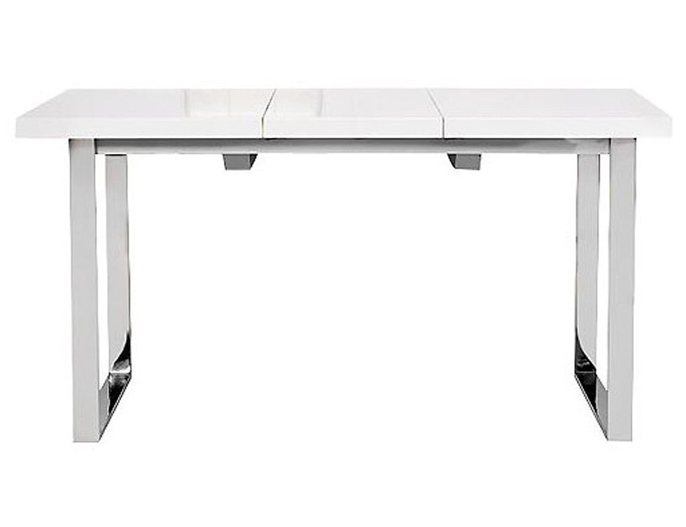 <p>Mesa de comedor extensible (de 150 cm a 190 cm) con tablero lacado en blanco y patas de acero inoxidable (399 €). De <strong>Urban Chic.</strong></p>