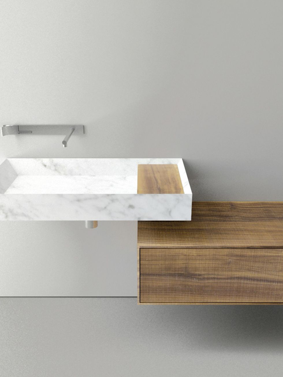 <p>Las vetas del mármol blanco Carrara dan belleza al lavabo<i> A45 Stone,</i> de Victor Vasilev para Boffi. Su color y su superficie pulida contrastan con el tacto de la madera.<i> Love it!&nbsp;</i></p>