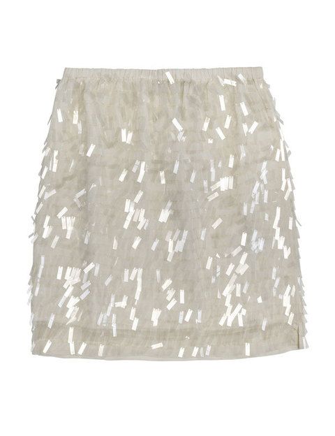 <p>Minifalda con pailletes blancas y transparentes de <strong>Zara.</strong></p>