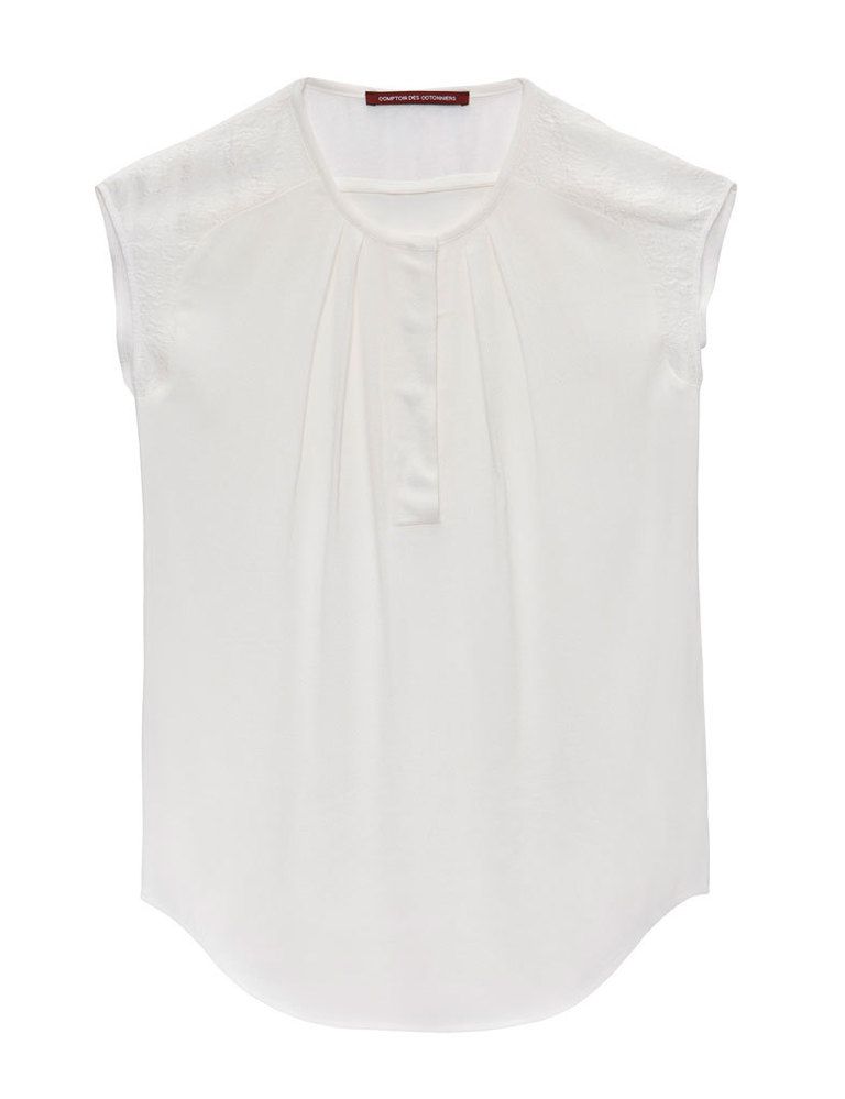 <p>Camisa blanca sin mangas, de <strong>Comptoir des Cotonniers </strong>(95 €).</p>