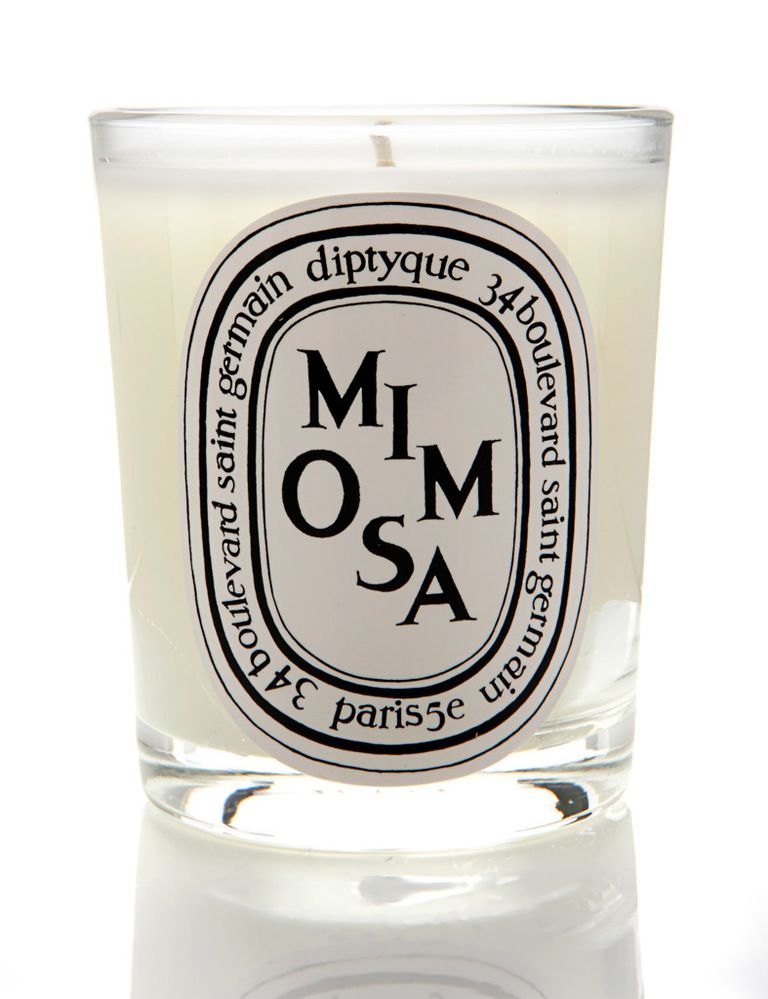 <p>'Mimosa' (46 €), vela perfumada de <strong>Diptyque</strong>.</p>