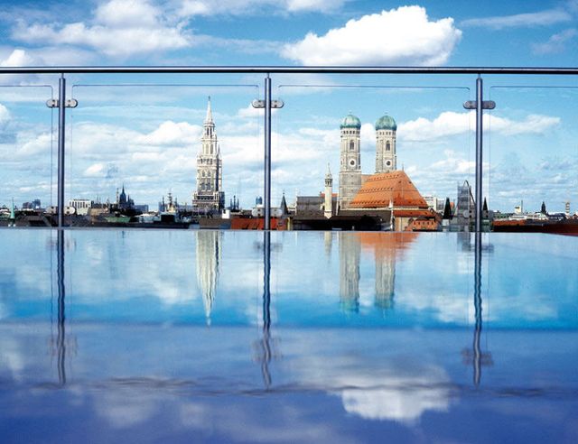 Body of water, Blue, Reflection, Water resources, Waterway, Spire, Aqua, Tower, Urban design, Cumulus, 