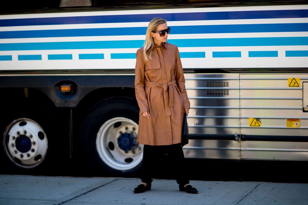 Coat, Jacket, Street fashion, Electric blue, Bag, Sunglasses, Overcoat, Luggage and bags, Bus, Public transport, 