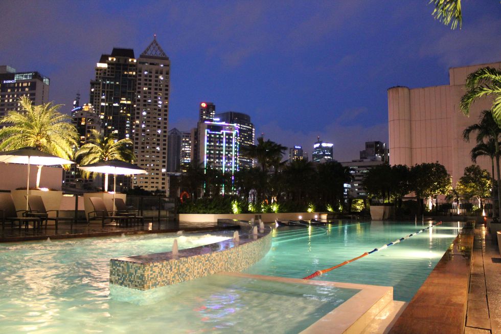 Swimming pool, Building, Resort, Real estate, Metropolitan area, Commercial building, Condominium, Tower block, Mixed-use, Skyscraper, 