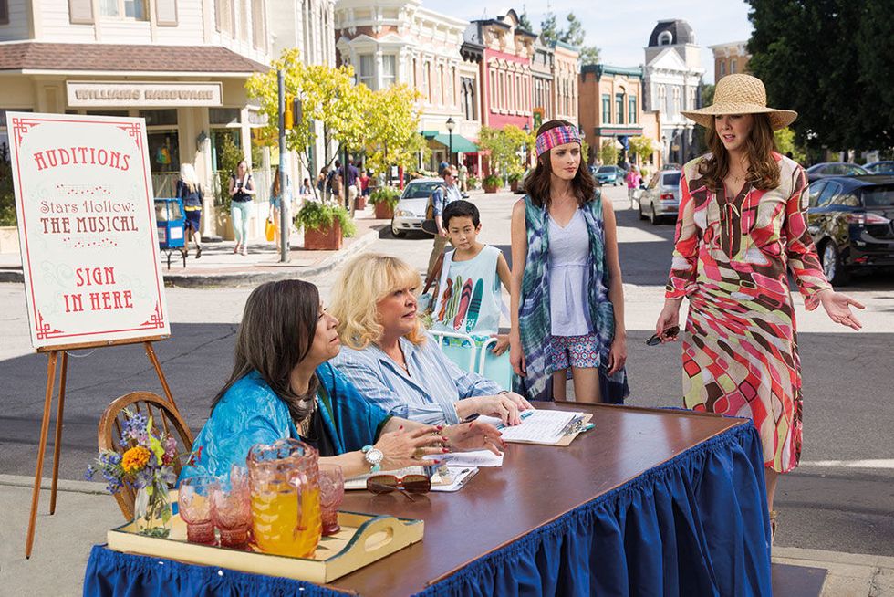 Tablecloth, Table, Furniture, Town, Hat, Fashion accessory, Sharing, Dress, Drink, Sun hat, 