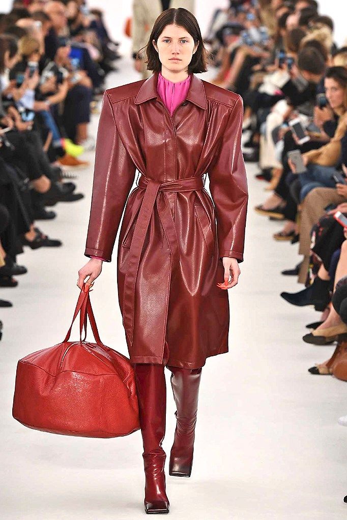Clothing, Brown, Fashion show, Textile, Red, Runway, Outerwear, Fashion model, Style, Bag, 