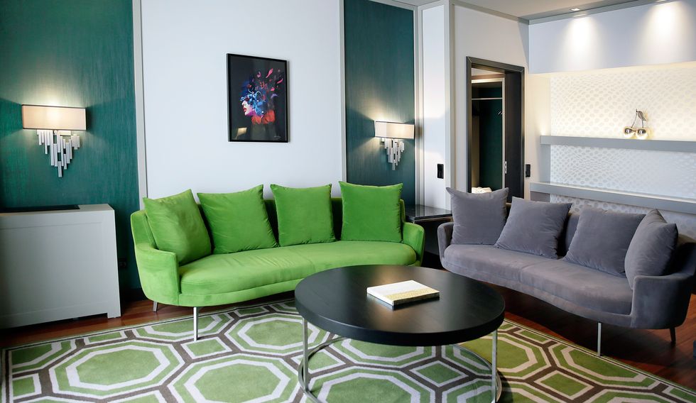 Green, Room, Interior design, Floor, Living room, Wall, Flooring, Furniture, Couch, Interior design, 