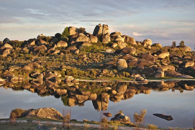 Natural landscape, Rock, Landscape, Bedrock, Reflection, Bank, Lake, Geology, Formation, Outcrop, 