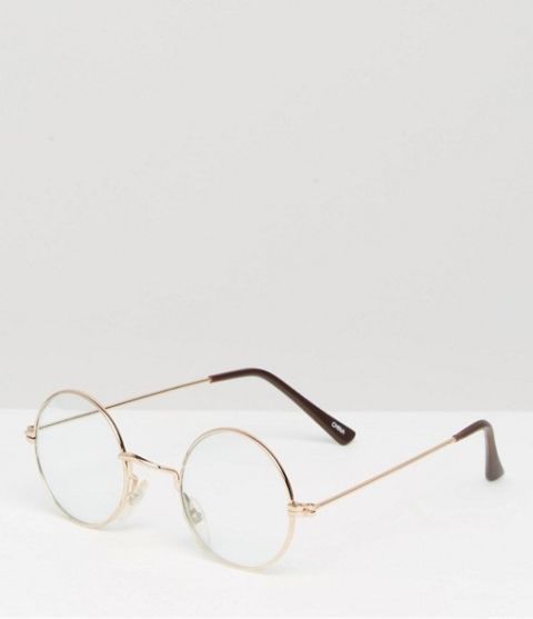 Eyewear, Vision care, Transparent material, Eye glass accessory, Tan, Circle, Still life photography, Silver, Shadow, 