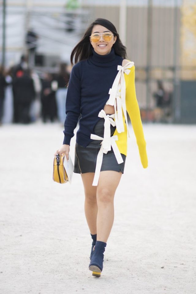 Clothing, Yellow, Sleeve, Bag, Shoulder, Human leg, Joint, Outerwear, Street fashion, Style, 