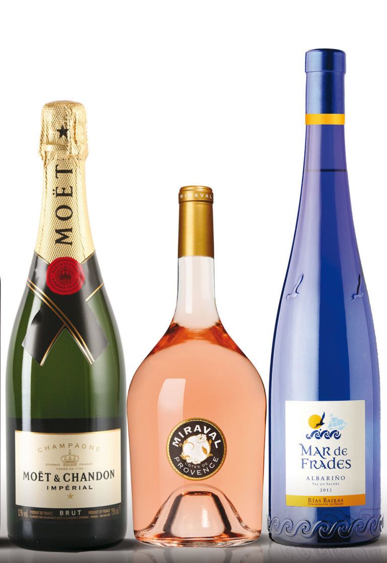 Product, Yellow, Bottle, Glass bottle, Alcohol, Drink, Bottle cap, Alcoholic beverage, Liquid, Wine bottle, 