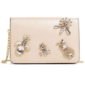 Petal, Metal, Body jewelry, Natural material, Silver, Brooch, Gemstone, Wallet, Artificial flower, Floral design, 