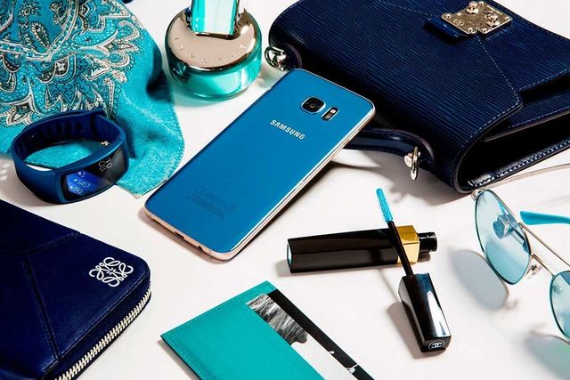 Blue, Everyday carry, Product, Turquoise, Gadget, Electric blue, Wallet, Fashion accessory, Material property, Mobile phone, 