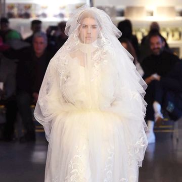 Bridal veil, Veil, Bridal clothing, Floor, Dress, Gown, Bride, Formal wear, Flooring, Wedding dress, 