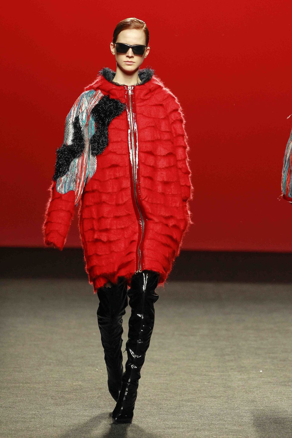 Sunglasses, Textile, Fashion show, Red, Outerwear, Winter, Fashion model, Style, Runway, Flag, 
