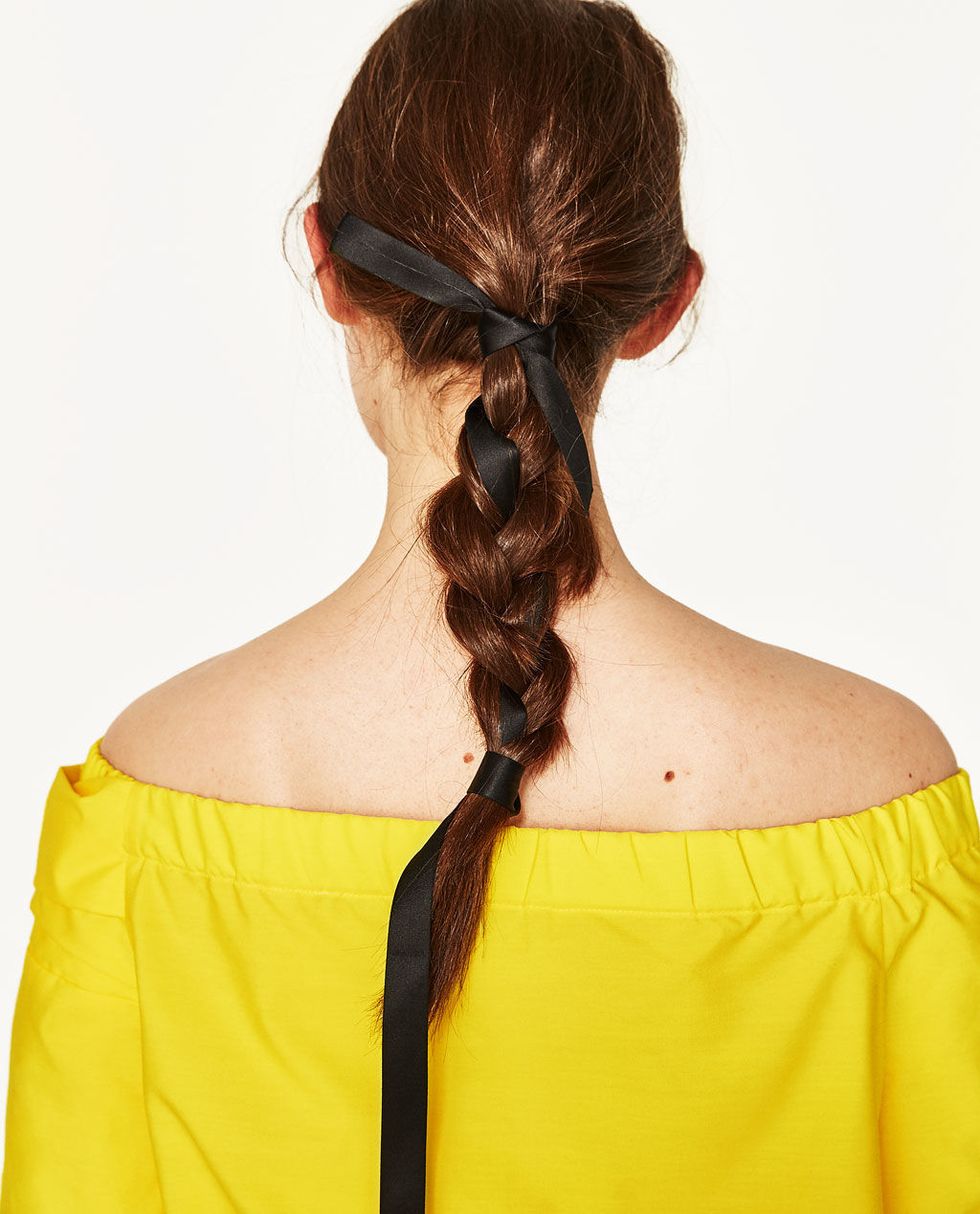 Hair, Hairstyle, Yellow, Shoulder, Long hair, Neck, Chignon, Bun, Brown hair, Ponytail, 