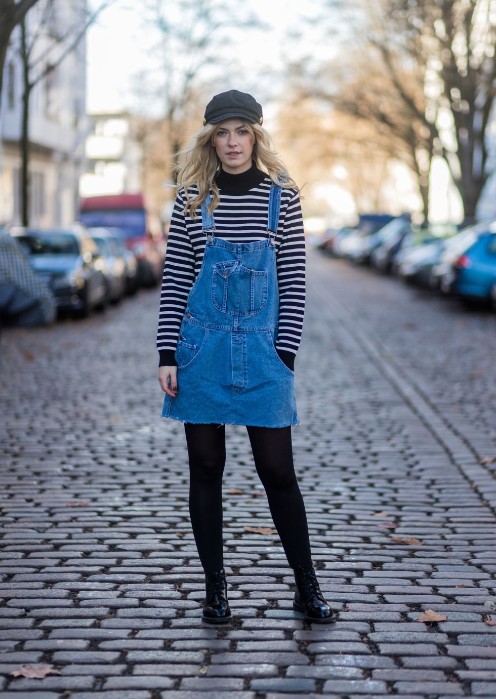 Clothing, Blue, Human body, Winter, Textile, Street, Photograph, Human leg, Outerwear, Road surface, 