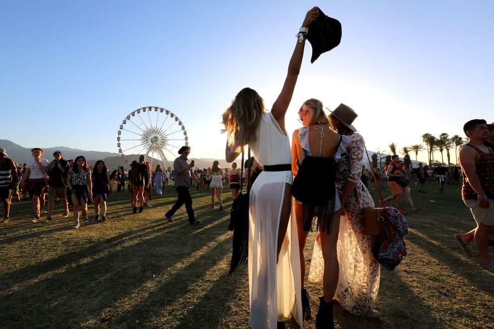 INDIO, CA - APRIL 16:  Music fans attend day 2 of the 2016 Coachella Valley Music &amp; Arts Festival (Weekend 1) at the Empire Polo Club on April 16, 2016 in Indio, California.  (Photo by David McNew/Getty Images for Coachella)
