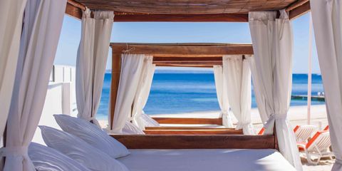 Room, Property, Suite, Furniture, Azure, Bed, Resort, Building, House, Canopy bed, 