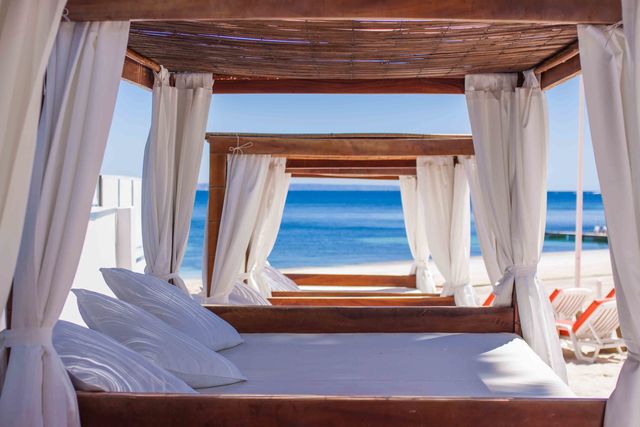 Room, Property, Suite, Furniture, Azure, Bed, Resort, Building, House, Canopy bed, 