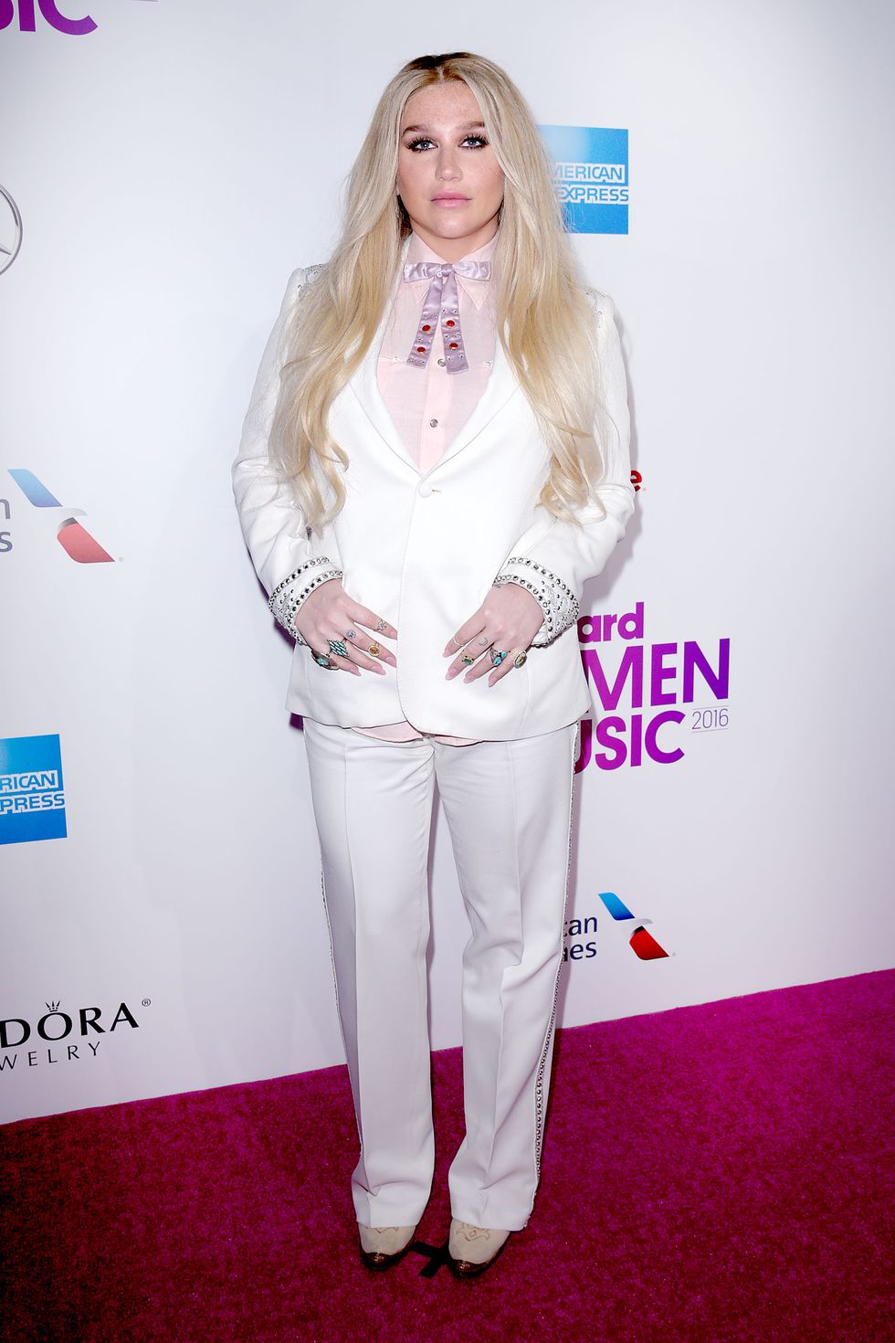 White, Clothing, Red carpet, Carpet, Fashion, Blond, Hairstyle, Flooring, Lip, Long hair, 