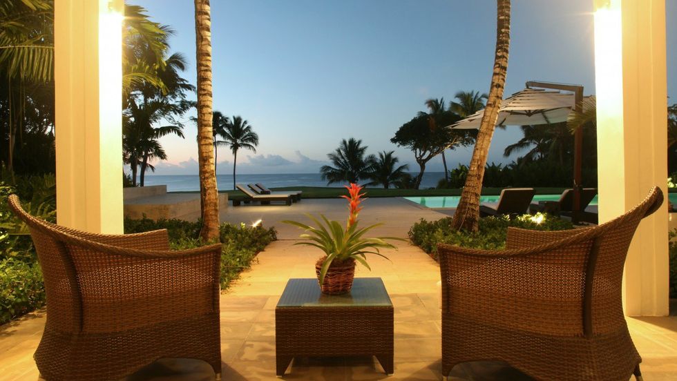 Resort, Landscape, Furniture, Real estate, Outdoor furniture, Woody plant, Arecales, Shade, Tints and shades, Tropics, 