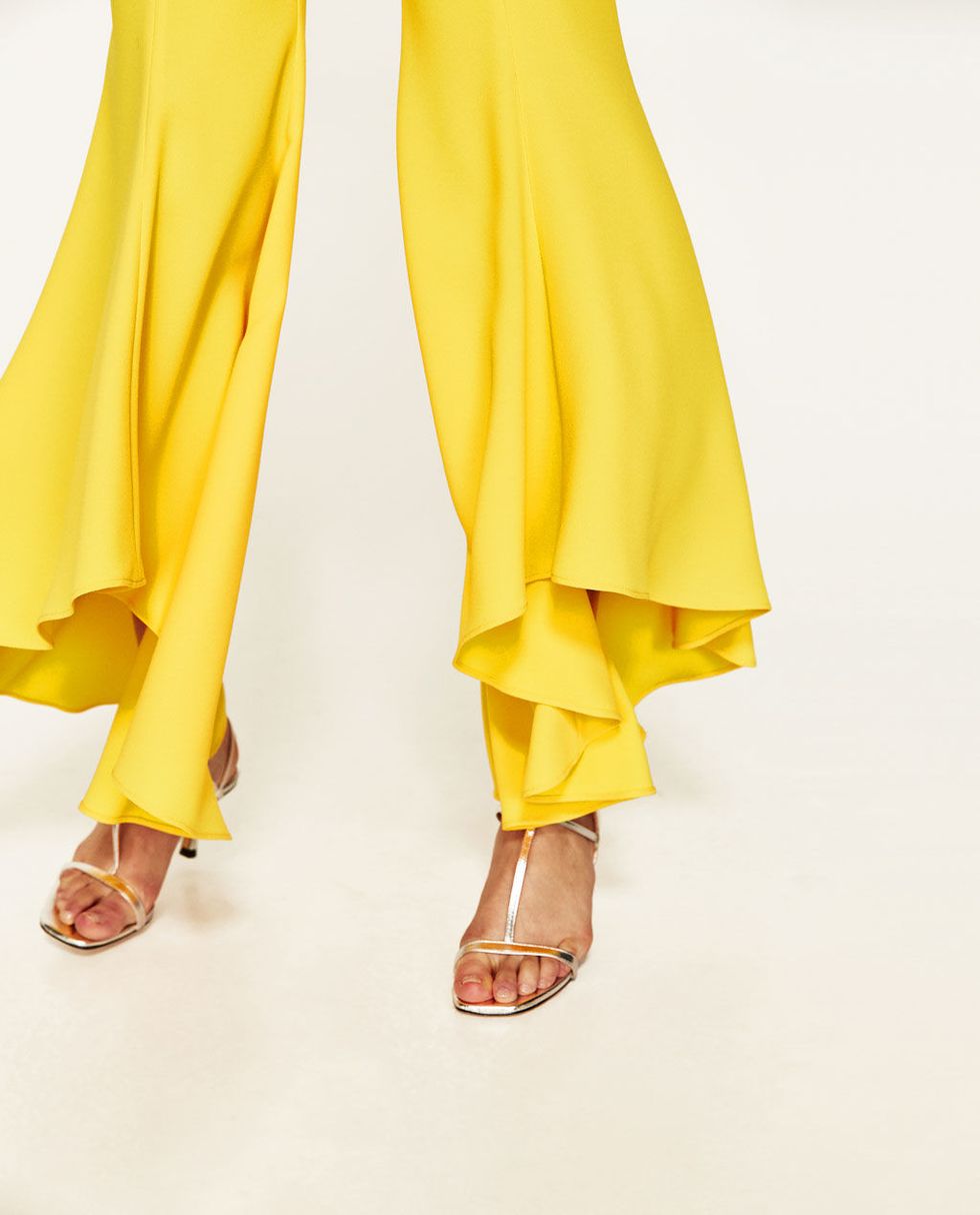 Yellow, Clothing, Footwear, Joint, Outerwear, Leg, Textile, Dress, Trousers, Dance, 