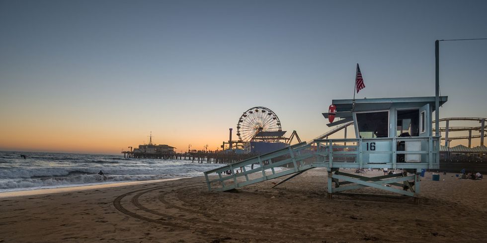 Ferris wheel, Beach, Sky, Pier, Shore, Sea, Tourist attraction, Ocean, Coast, Sand, 