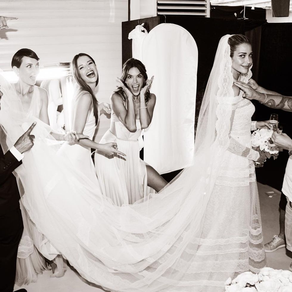 Wedding dress, Photograph, Gown, Dress, Bridal clothing, Bride, Veil, Bridal accessory, Bridal veil, Shoulder, 