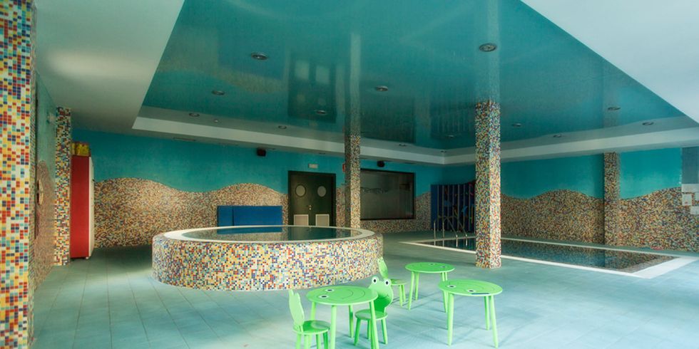 Turquoise, Aqua, Interior design, Architecture, Building, Ceiling, Room, Table, Leisure centre, Leisure, 