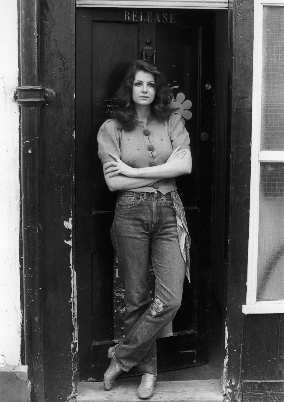 Photograph, Standing, Snapshot, Black-and-white, Monochrome, Photography, Jeans, Leg, Vintage clothing, Long hair, 