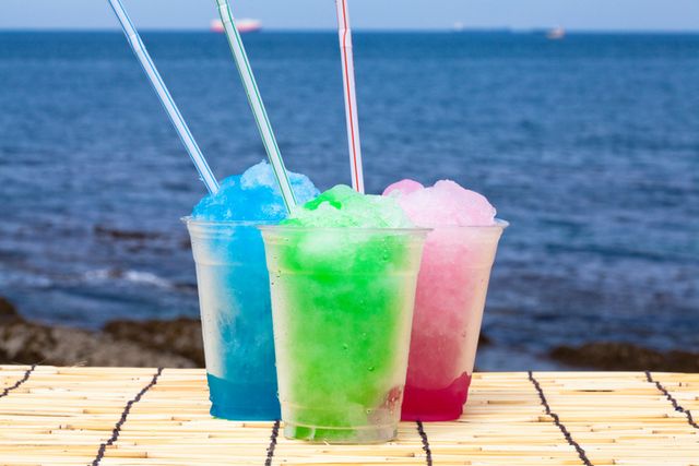 Drink, Rum swizzle, Drinking straw, Non-alcoholic beverage, Blue hawaii, Slush, Italian soda, Cocktail, Blue lagoon, Cocktail garnish, 