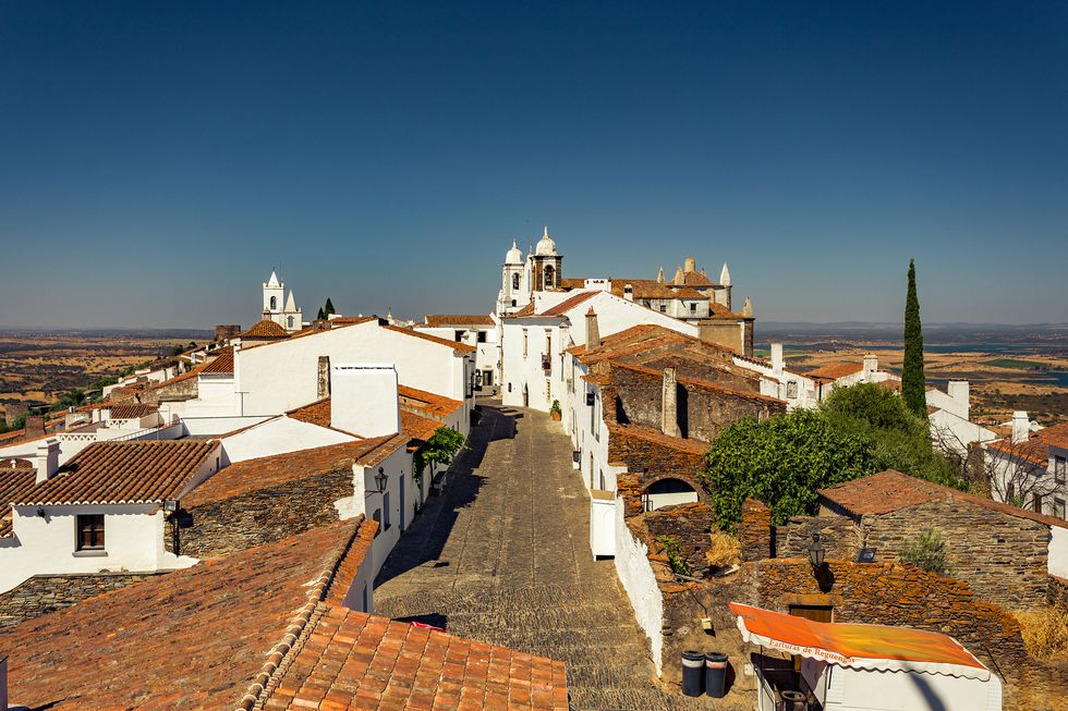 Roof, Town, Sky, Human settlement, Village, City, Neighbourhood, Building, Wall, House, 