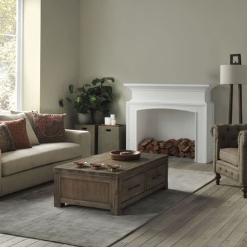 Furniture, Living room, Room, Floor, Laminate flooring, Wood flooring, Interior design, Coffee table, Flooring, Couch, 