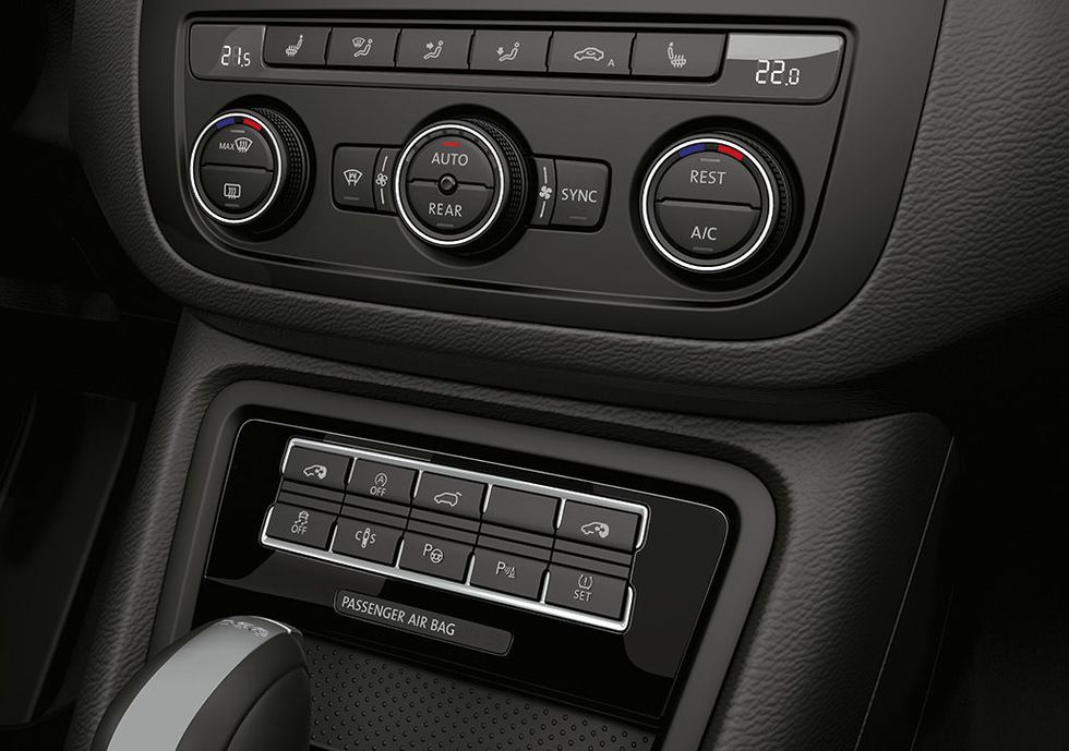 Vehicle, Center console, Car, Gear shift, Auto part, Subcompact car, Hatchback, Volkswagen, 