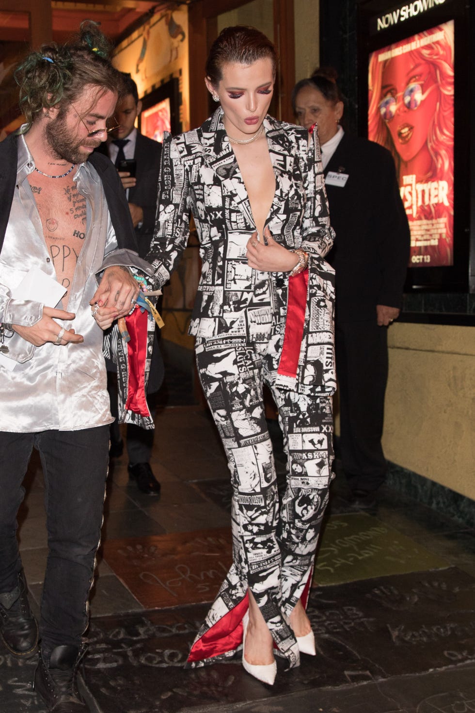 Bella Thorne and her date are seen leaving The Baby Sitter Premiere at the Vista Theater in Los Angeles, California 