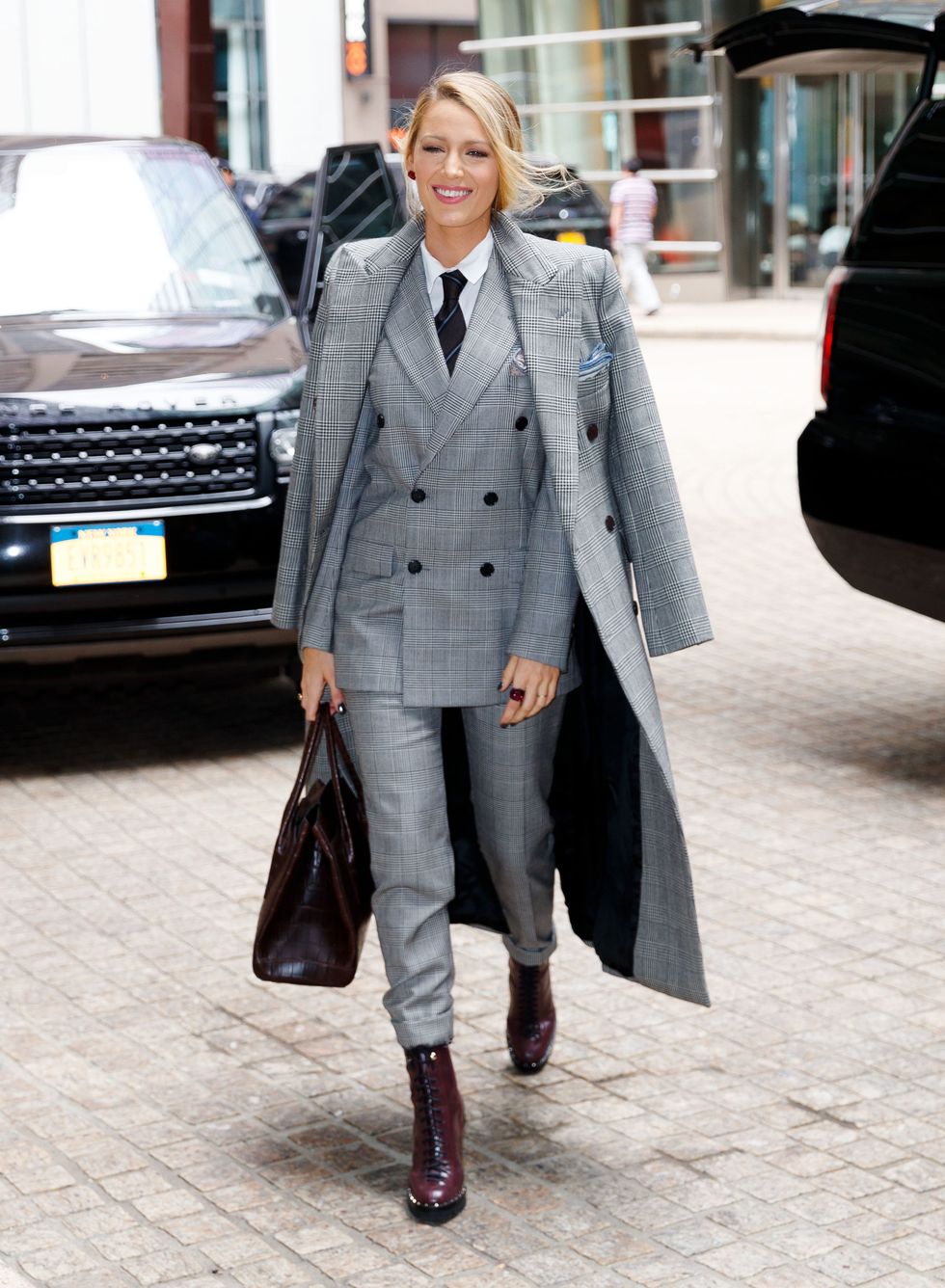 Blake Lively out and about in a double breasted suit in New York.