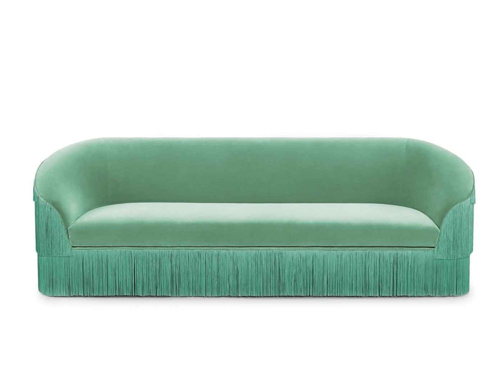 Sofá verde con flecos, modelo Fringes, de Munna