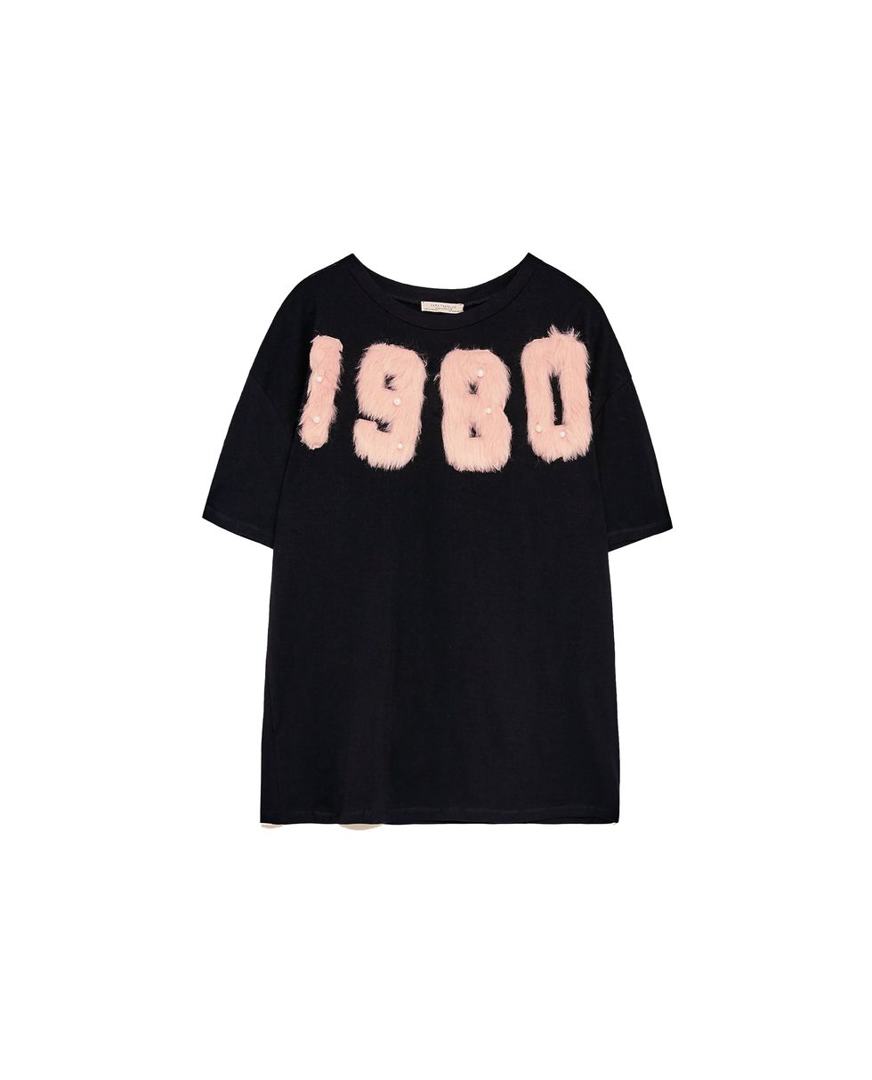 Clothing, Black, T-shirt, White, Sleeve, Crop top, Top, Outerwear, Font, Blouse, 