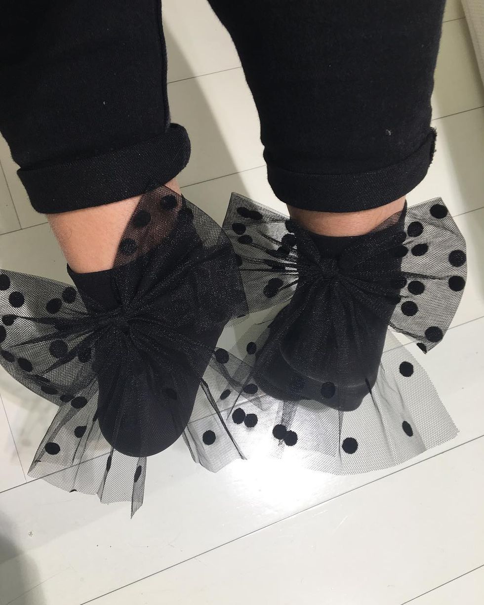 Black, Footwear, Shoe, Human leg, Leg, Ankle, Fashion, Design, Black-and-white, Hand, 