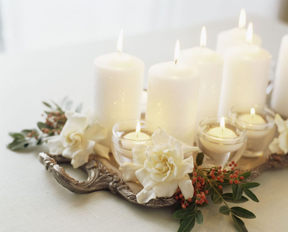 Candle, White, Lighting, Unity candle, Flower, Candle holder, Wax, Plant, Interior design, Centrepiece, 