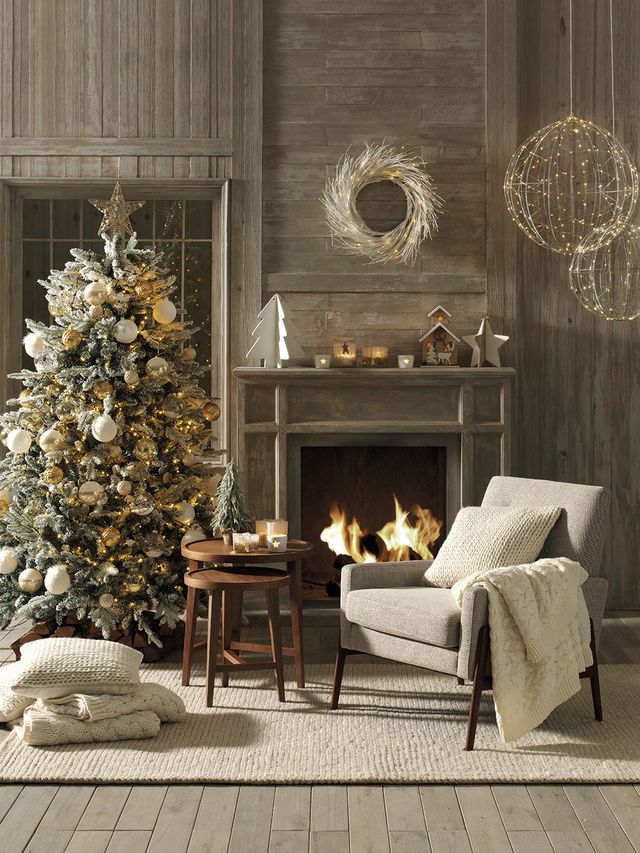 Living room, Room, Christmas tree, Furniture, Interior design, Christmas decoration, Tree, Wall, Ornament, Table, 