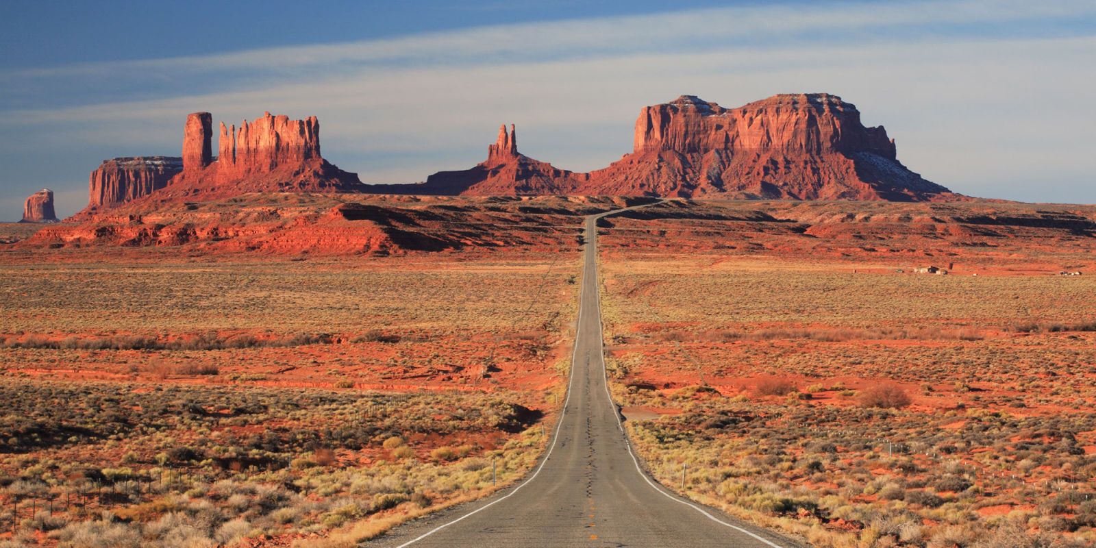 Mountainous landforms, Butte, Natural landscape, Rock, Landmark, Sky, Formation, Badlands, Road, National park, 