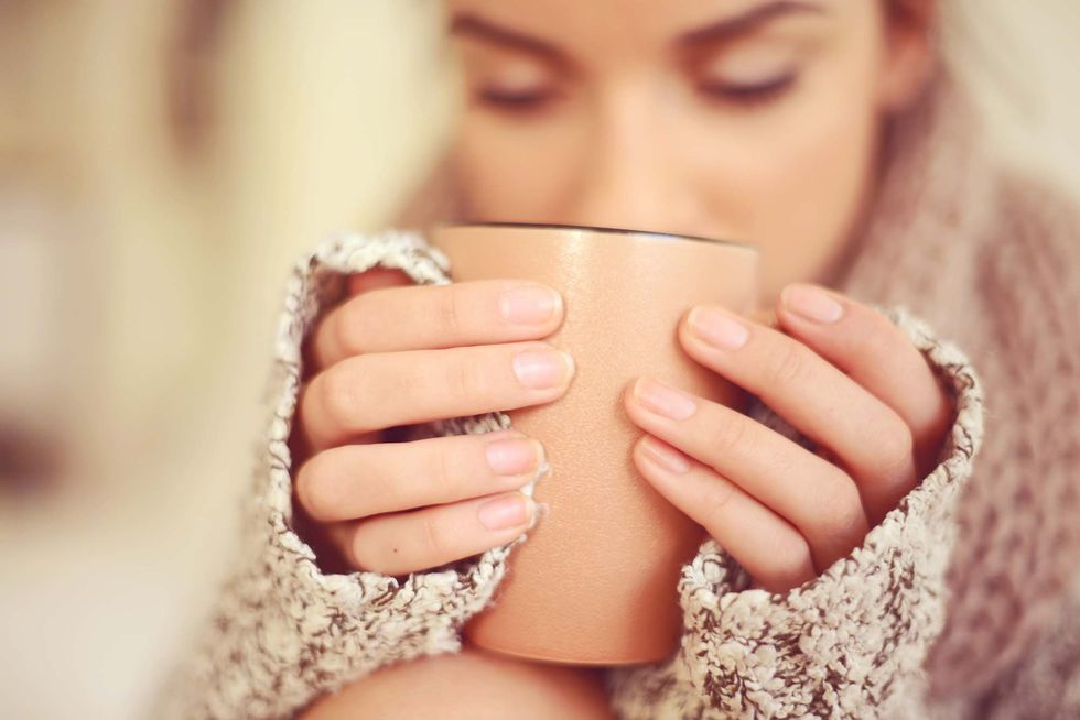 Skin, Face, Nail, Beauty, Lip, Hand, Engagement ring, Ring, Drinking, Finger, 