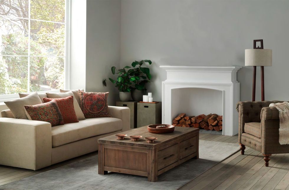 Furniture, Living room, Room, Interior design, Couch, Floor, Table, Coffee table, Laminate flooring, Wood flooring, 