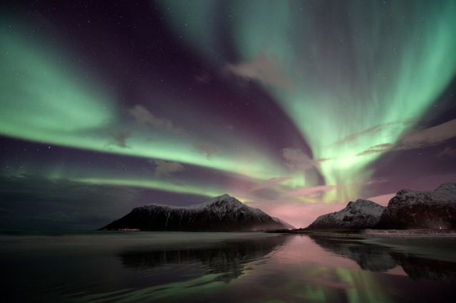 aurora borealis over the Lofoten Island of Flakstad?ya, Arctic Norway