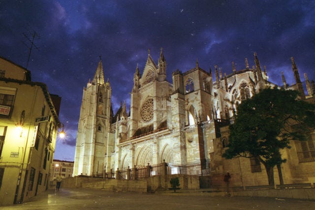 Architecture, Landmark, Sky, Gothic architecture, Building, Cathedral, Spire, Night, Medieval architecture, Place of worship, 