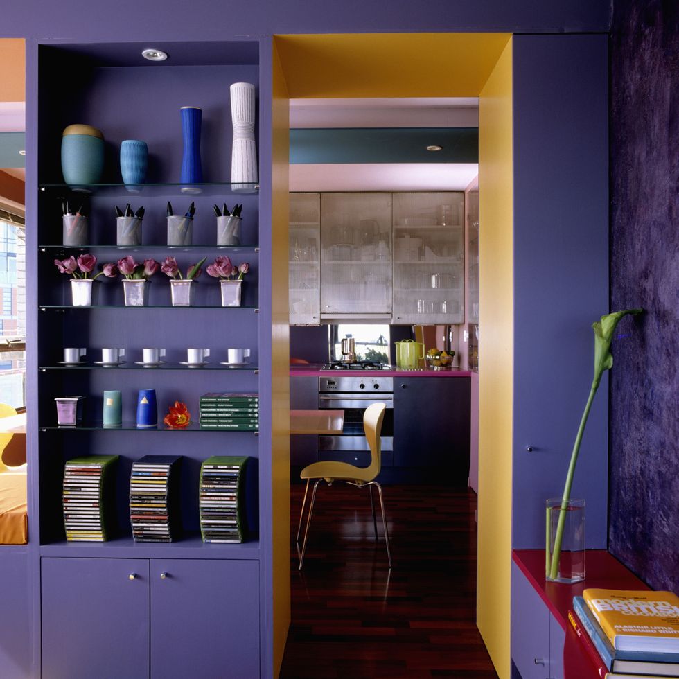 Shelf, Room, Furniture, Yellow, Interior design, Building, Purple, Shelving, Wall, Cupboard, 