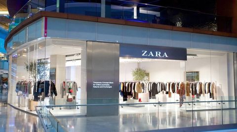 Building, Outlet store, Boutique, Display window, Shopping mall, Retail, Glass, Interior design, Trade, 