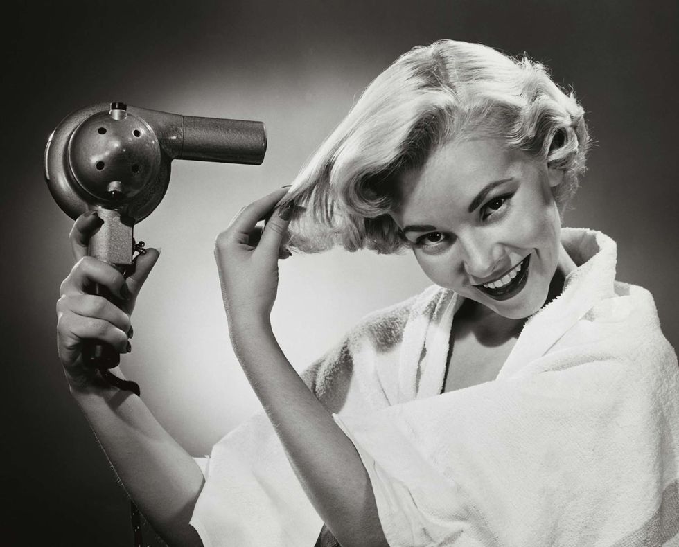 Photograph, Hair dryer, Black-and-white, Arm, Monochrome, Blond, Photography, Hand, Stock photography, Ear, 